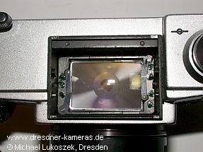 wechselbare Bildfeldlinsen an der Anschlussstelle f�r Wechselsucher 