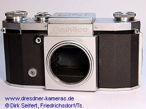 Praktica, flash sync. (DIN-socket) retrofitted (Praktica, 1th version wit cast-on strap lugs and 2nd version with screwed strap lugs); Importeur: Kine Camera Co. a Division of Ocean Photo Supply Co. Inc., 11 West 20th Street, New York 11, N.Y.